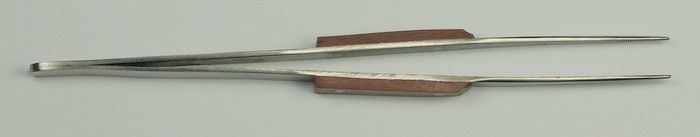 Soldering tweezers with fiber grips and serrated tips