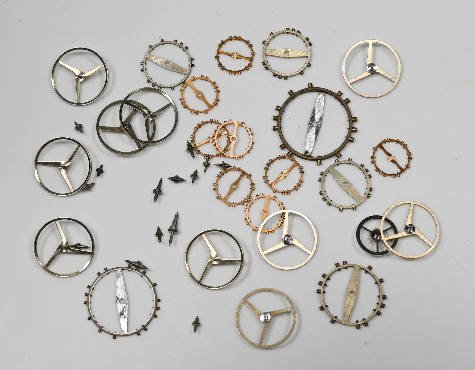 25x New Pocketwatch Balance Wheels & staffs Repairs Parts Spares Watchmakers